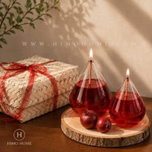 شمع پیرکس اشکی پک یلدای بزرگ با روغن قرمز، جعبه هدیه حصیری و طراحی دست‌ساز مناسب دکور و هدیه شب یلدا