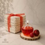 شمع پیرکس حبابی پک هدیه یلدای کوچک هیموهوم با مایع قرمز، انار و جعبه حصیری هدیه