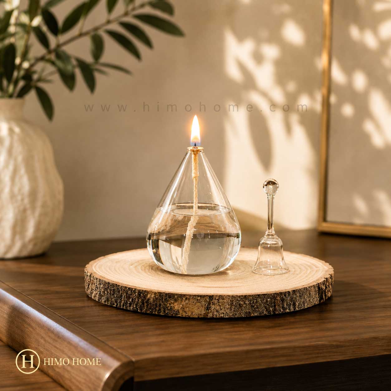 pyrex-teardrop-candle-7cm-himohome شمع پیرکس اشکی قطر ۷ سانتیمتر هیموهوم با طراحی دستساز، شعله روغنی و بدنه شیشهای شفاف